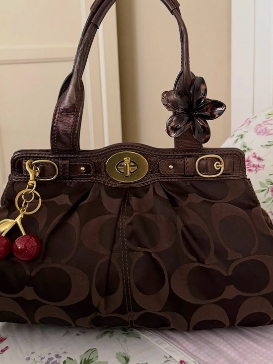 Coach Handbags - Coach Brown Signature Canvas Shoulder Bag with Cherry Charm